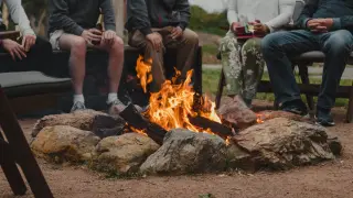 Gathering around a fire